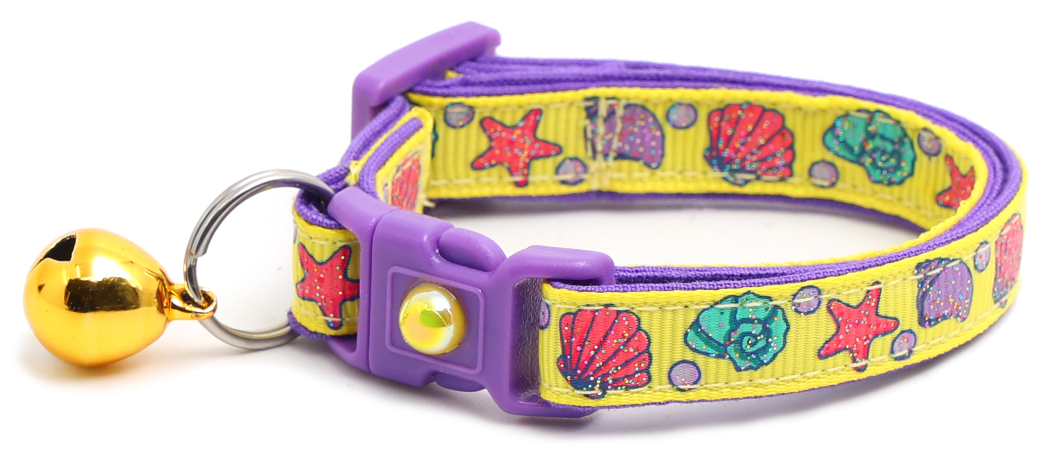 Beachcomber Breakaway Cat Collar in vibrant colors, featuring a breakaway clip and removable bell, made from soft reinforced cotton.